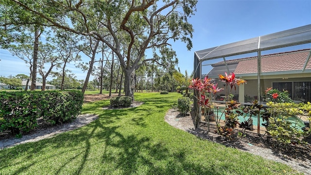 3984 Lyndhurst Ct, Sarasota, FL 34235 - view of yard featuring a swimming pool and glass enclosure