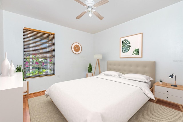 3781 59th Ave W Unit 3781, Bradenton, FL 34210 - bedroom with light wood-type flooring and a ceiling fan