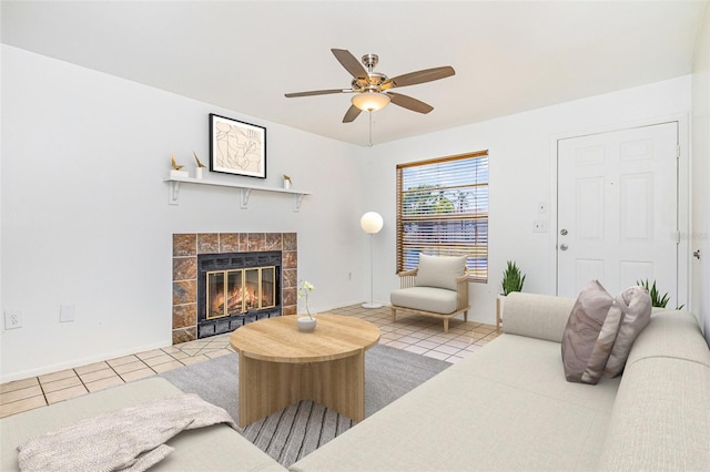 3781 59th Ave W Unit 3781, Bradenton, FL 34210 - living area with tile patterned flooring, a ceiling fan, and a fireplace