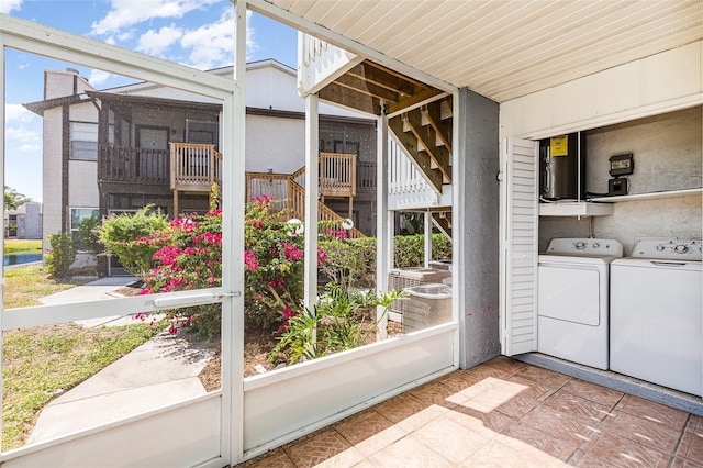 3781 59th Ave W Unit 3781, Bradenton, FL 34210 - unfurnished sunroom with washing machine and dryer