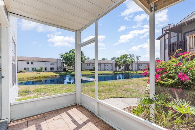 3781 59th Ave W Unit 3781, Bradenton, FL 34210 - unfurnished sunroom with a water view and a residential view
