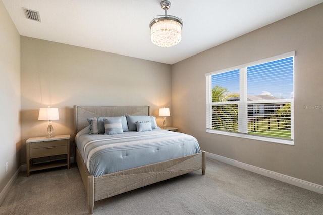 4815 Deep Creek Ter, Parrish, FL 34219 - carpeted bedroom featuring baseboards and a chandelier