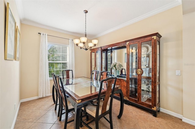 dining area featuring a chandelier, baseboards, crown molding, and light tile patterned floors