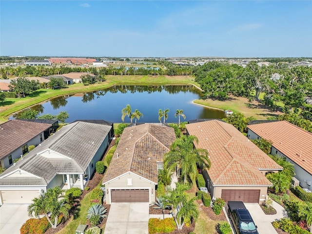 aerial view of residential area with a nearby body of water