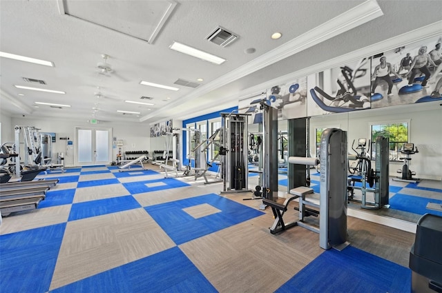 workout area with carpet flooring, ornamental molding, french doors, a textured ceiling, and ceiling fan