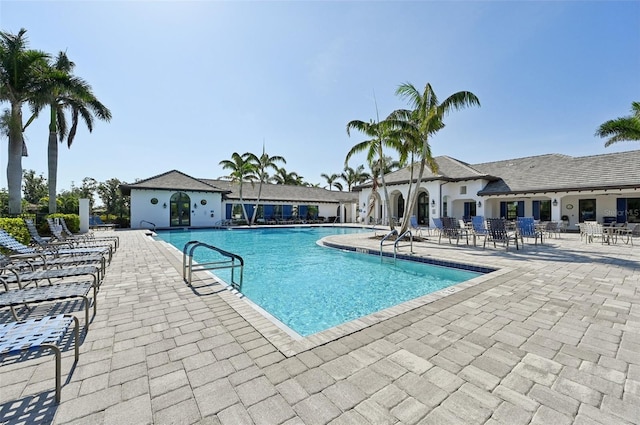 community pool with a patio