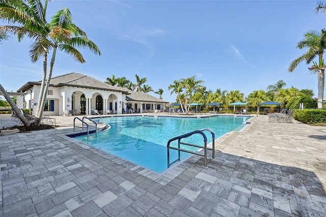 community pool with a patio