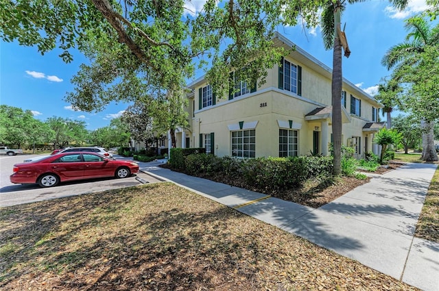 view of home's exterior with stucco siding