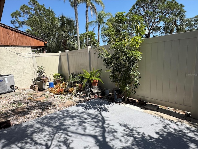 2058 Sunset Point Rd Unit 11, Clearwater, FL 33765 - view of patio / terrace featuring central AC