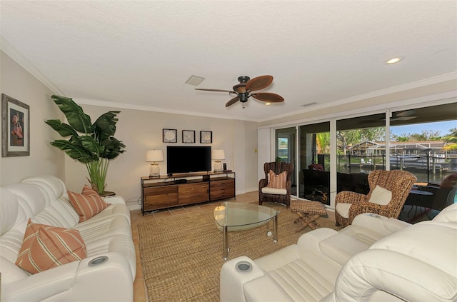 tiled living room with crown molding, a ceiling fan, visible vents, and recessed lighting
