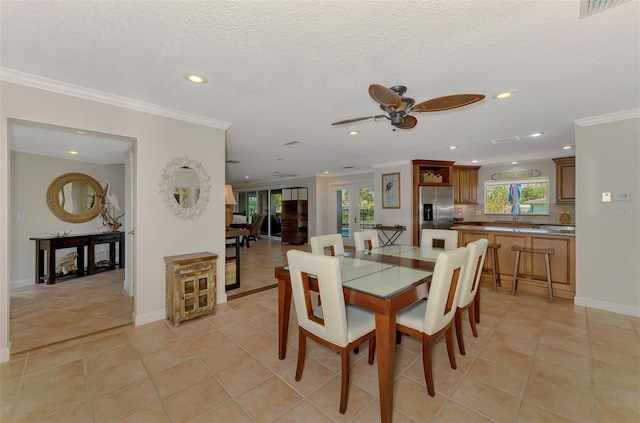 dining room featuring light tile patterned floors, ceiling fan, ornamental molding, and recessed lighting