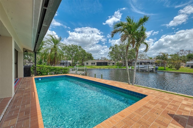 outdoor pool with a water view