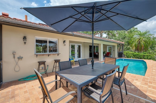 exterior space featuring a patio and outdoor dining area