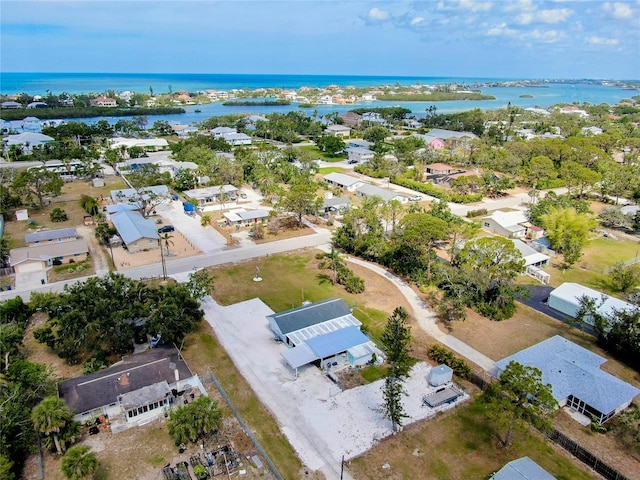 aerial view featuring a water view and a residential view