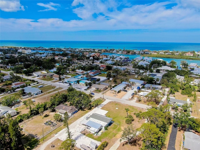 aerial view featuring a water view and a residential view