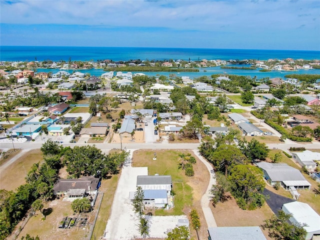 aerial view featuring a water view and a residential view