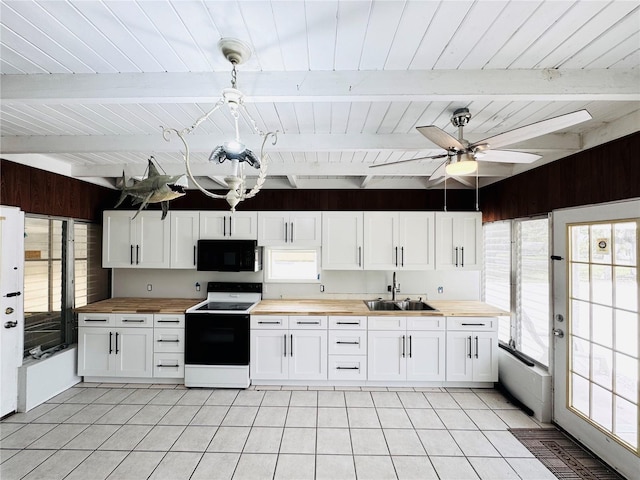 kitchen with a sink, wood counters, beamed ceiling, electric stove, and black microwave