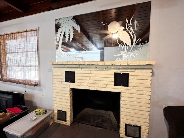 details featuring a fireplace and concrete flooring
