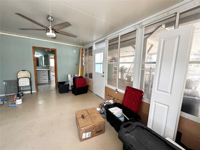 interior space with a ceiling fan