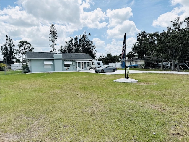 view of yard featuring fence