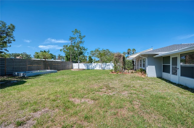 view of yard with fence