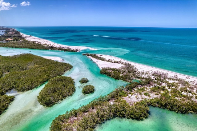 aerial view with a beach view and a water view