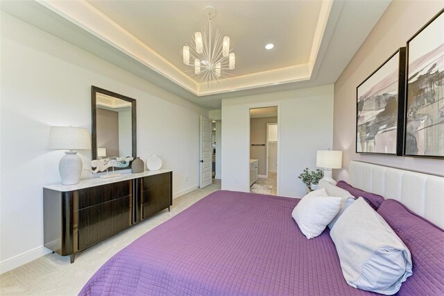 bedroom featuring light colored carpet, baseboards, a notable chandelier, a tray ceiling, and recessed lighting