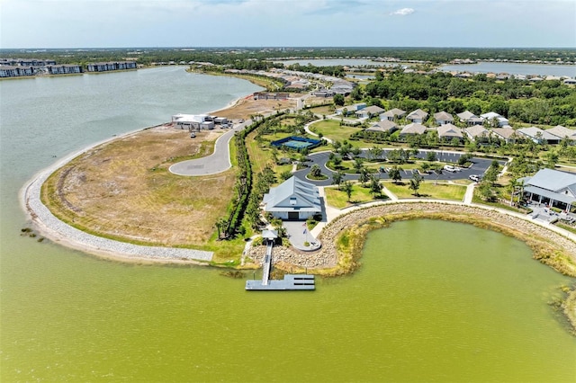 bird's eye view featuring a residential view and a water view