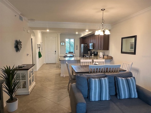 dining room featuring visible vents, ornamental molding, light tile patterned flooring, and a notable chandelier