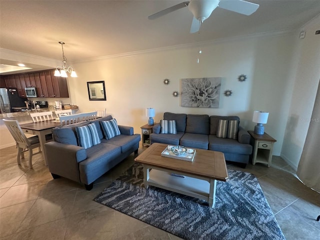 living room with light tile patterned floors, ornamental molding, and ceiling fan