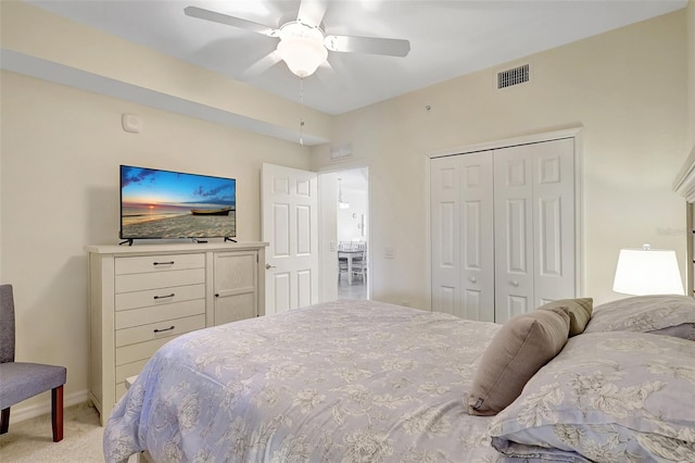 17118 Vardon Ter Unit 304, Bradenton, FL 34211 - bedroom with a closet, light carpet, a ceiling fan, and baseboards