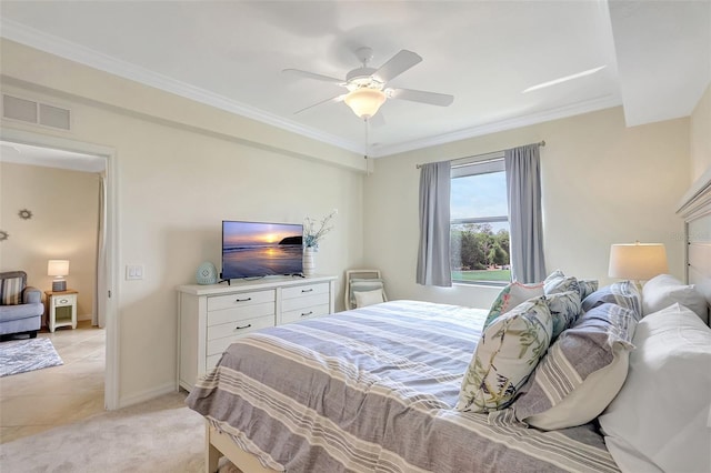 17118 Vardon Ter Unit 304, Bradenton, FL 34211 - bedroom with ornamental molding, a ceiling fan, light carpet, and baseboards