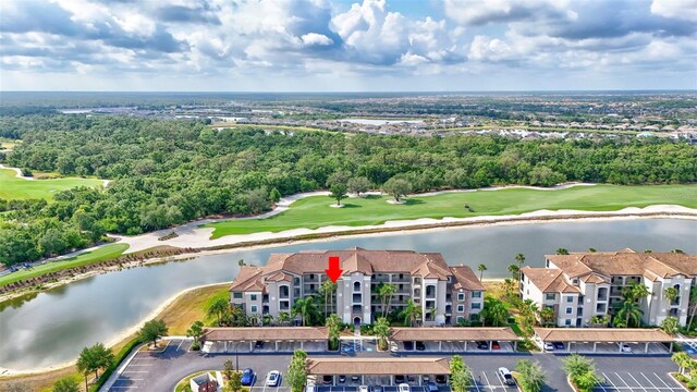 17118 Vardon Ter Unit 304, Bradenton, FL 34211 - aerial view of a golf club, a nearby body of water, apartment complex / building, and a tree filled landscape