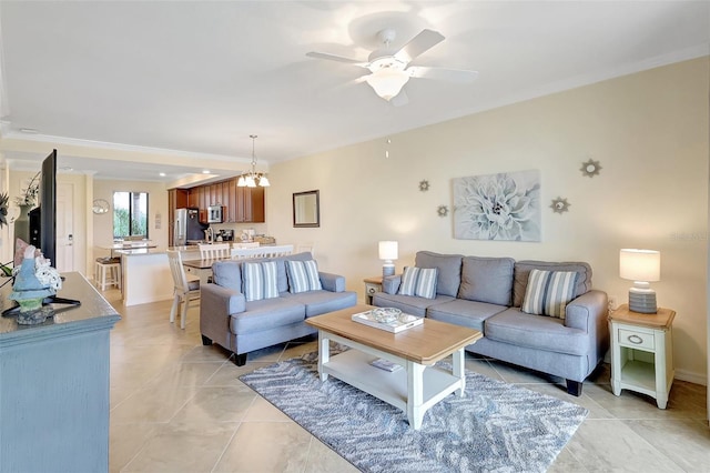 17118 Vardon Ter Unit 304, Bradenton, FL 34211 - living room featuring ornamental molding, a ceiling fan, light tile patterned floors, and a chandelier