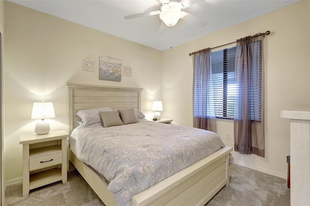 17118 Vardon Ter Unit 304, Bradenton, FL 34211 - bedroom featuring light carpet, baseboards, and ceiling fan