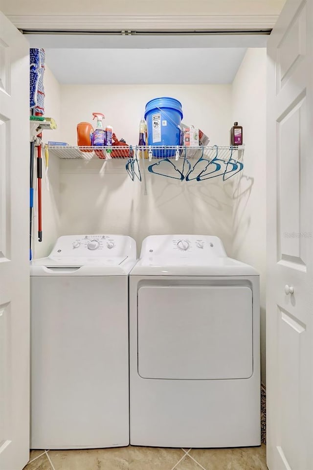 17118 Vardon Ter Unit 304, Bradenton, FL 34211 - clothes washing area featuring washing machine and clothes dryer and light tile patterned floors