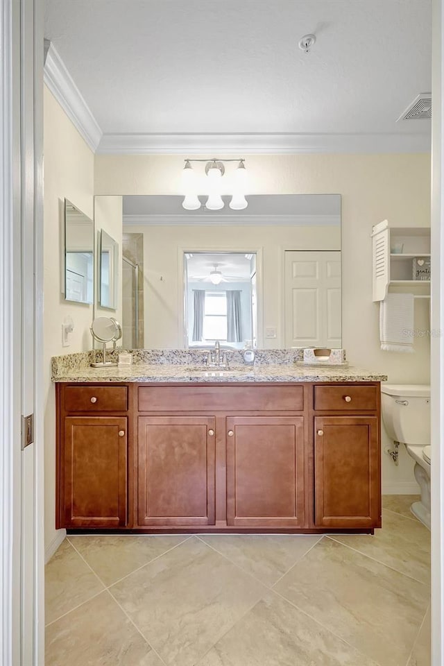 17118 Vardon Ter Unit 304, Bradenton, FL 34211 - bathroom with ornamental molding, a shower stall, toilet, tile patterned flooring, and vanity