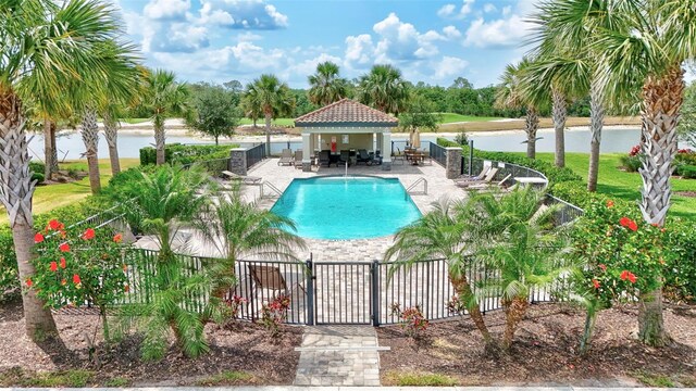 17118 Vardon Ter Unit 304, Bradenton, FL 34211 - community pool with a water view, a gazebo, a gate, and a patio