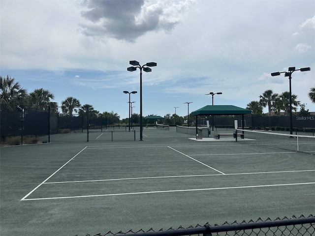 17118 Vardon Ter Unit 304, Bradenton, FL 34211 - view of tennis court featuring fence
