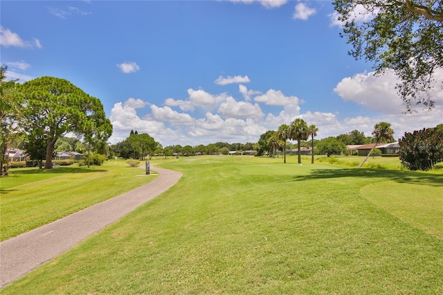5362 Huntingwood Ct Unit 16, Sarasota, FL 34235 - surrounding community with golf course view and a yard