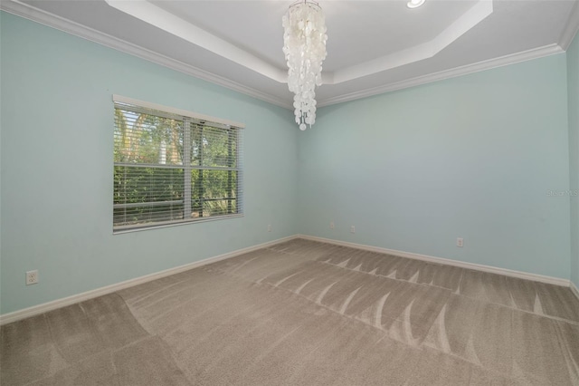 11634 Piedmont Park Xing, Bradenton, FL 34211 - carpeted spare room with a raised ceiling, baseboards, crown molding, a chandelier, and recessed lighting