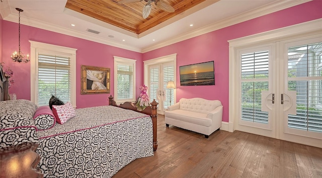 bedroom with a raised ceiling, wood-type flooring, access to outside, french doors, and wooden ceiling