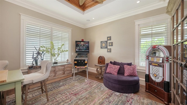 home office with wood finished floors, healthy amount of natural light, ornamental molding, baseboards, and recessed lighting