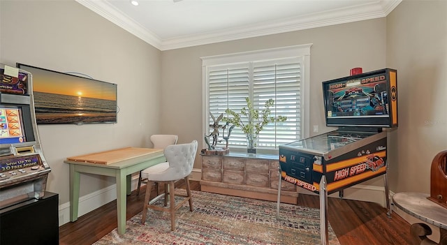 office with wood finished floors, crown molding, and baseboards