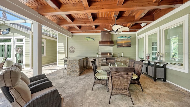 view of patio / terrace featuring an outdoor kitchen and outdoor dining space