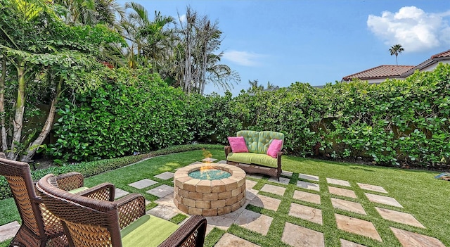 view of patio / terrace with an outdoor fire pit