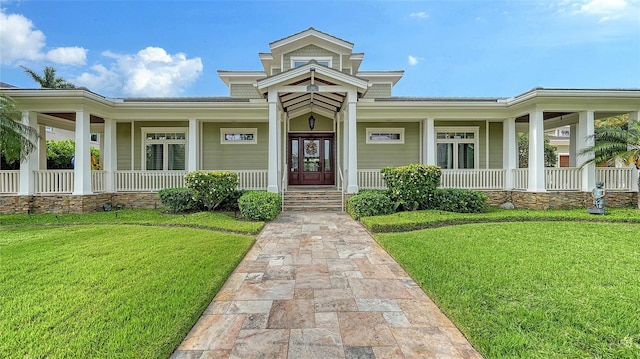 view of front of house featuring a porch and a front lawn