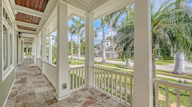 unfurnished sunroom featuring plenty of natural light