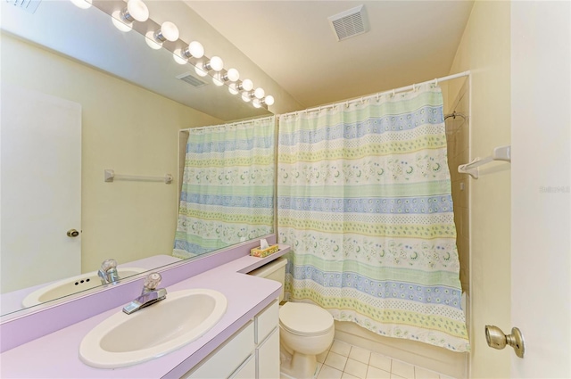 bathroom featuring vanity, tile patterned flooring, toilet, and visible vents