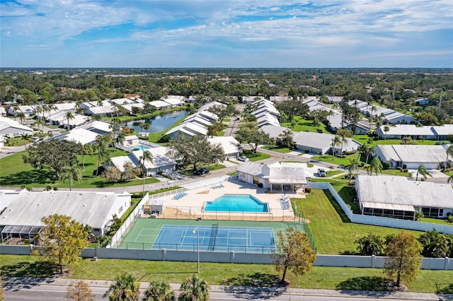 bird's eye view featuring a residential view and a water view